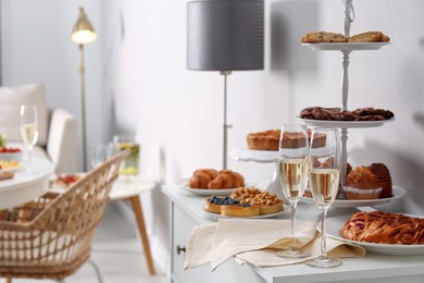 Photo of Variety of snacks served on tables indoors in buffet style