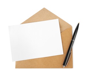 Photo of Brown envelope with blank letter and pen on white background, top view