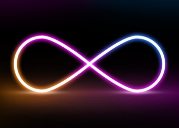 Glowing colorful neon frame in shape of infinity sign on black background