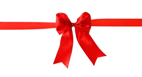 Photo of Red ribbon with bow on white background. Festive decoration