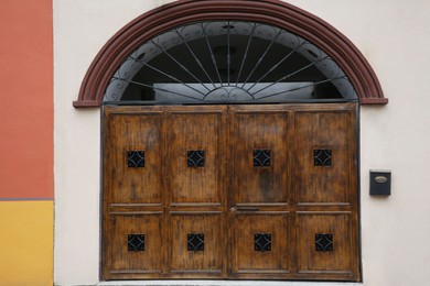 Photo of Exterior of building with beautiful wooden gates