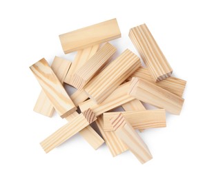 Photo of Pile of wooden blocks on white background, top view. Jenga game