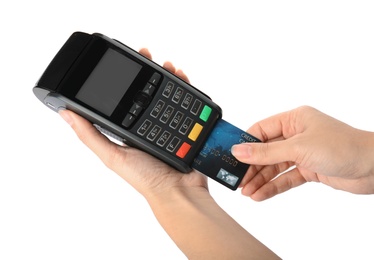 Woman using modern payment terminal on white background, closeup