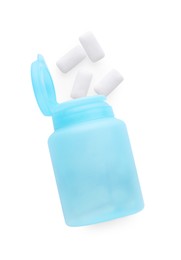 Photo of Light blue jar with chewing gums on white background, flat lay