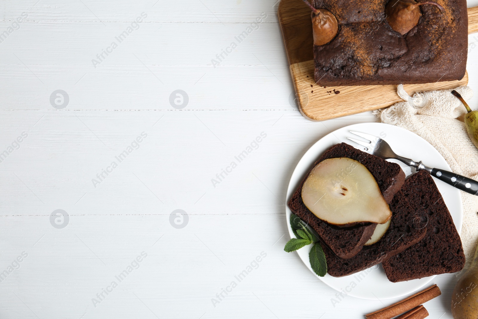 Flat lay composition with tasty pear bread on white wooden table, space for text. Homemade cake Photo of Flat lay composition with tasty pear bread on white wooden table, space for text. Homemade cake