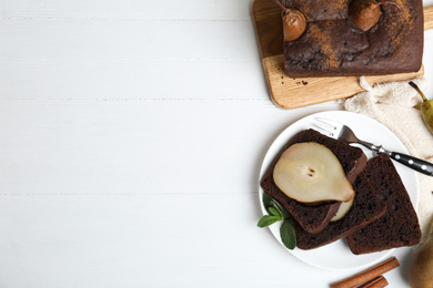Photo of Flat lay composition with tasty pear bread on white wooden table, space for text. Homemade cake