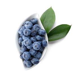 Photo of Bowl full of fresh ripe blueberries on white background, top view