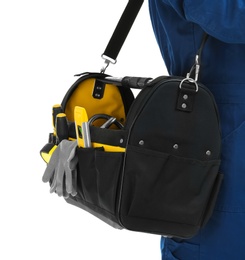 Photo of Professional plumber with tool bag on white background