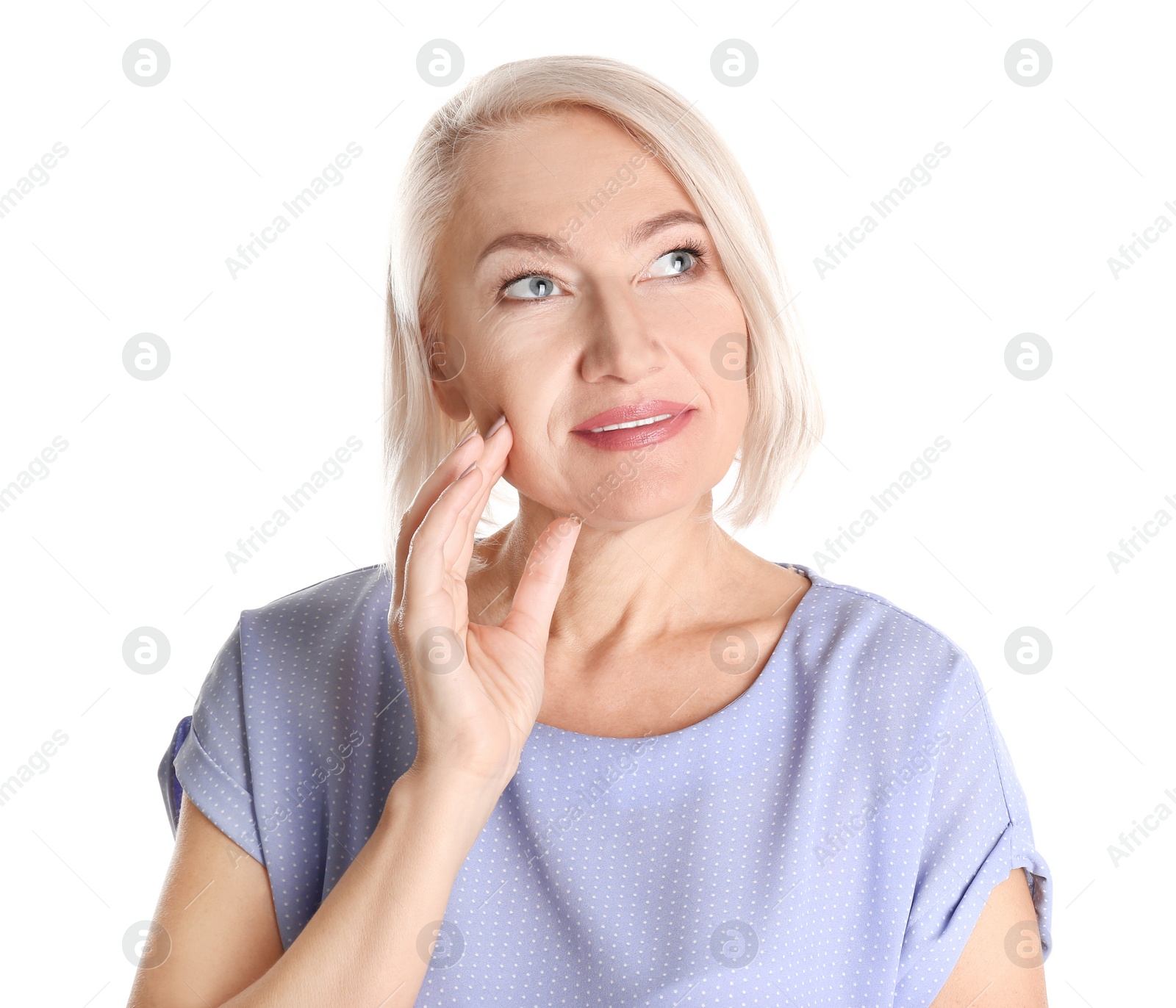 Photo of Portrait of charming mature woman with healthy beautiful face skin and natural makeup on white background