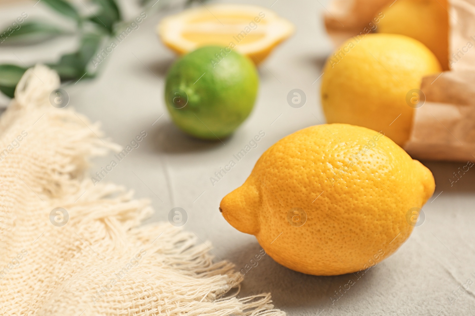 Photo of Fresh lemon on grey table