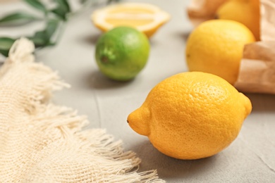 Photo of Fresh lemon on grey table