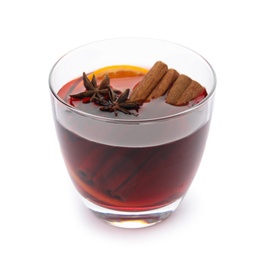 Photo of Glass of mulled wine with spices isolated on white