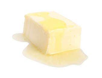 Photo of Piece of melting butter on white background