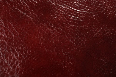 Beautiful red leather as background, above view