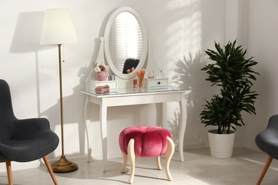 Stylish room interior with elegant dressing table