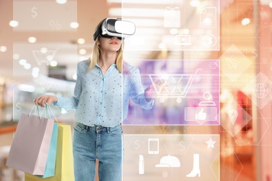 Image of Young woman with shopping bags using virtual reality headset in simulated store