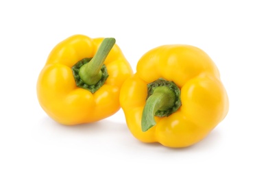 Ripe yellow bell peppers isolated on white