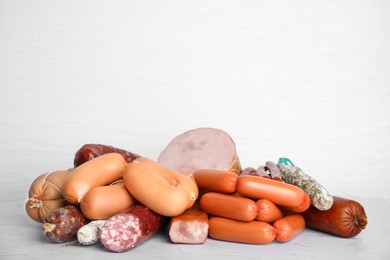 Photo of Different types of sausages on light table
