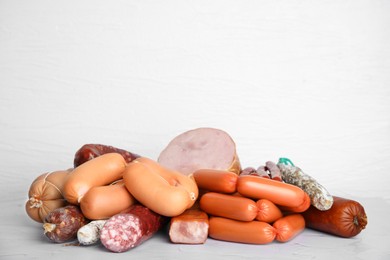 Different types of sausages on light table