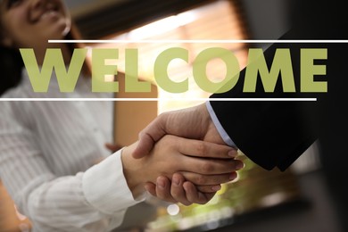 Welcome to team. Employee shaking hands with intern in office, closeup