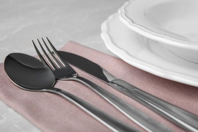 Photo of Beautiful table setting on grey marble background