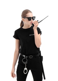 Female security guard using portable radio transmitter on white background