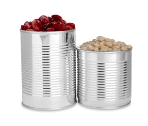 Photo of Tin cans with different kidney beans on white background