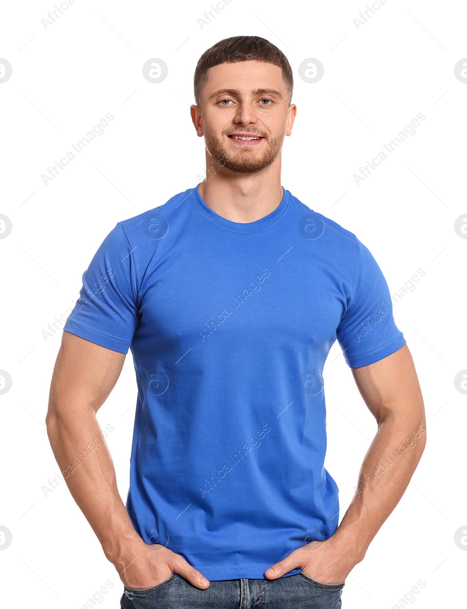 Photo of Man wearing blue t-shirt on white background. Mockup for design