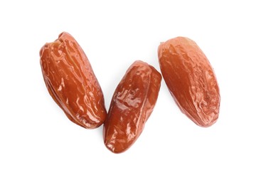 Tasty sweet dried dates on white background, top view