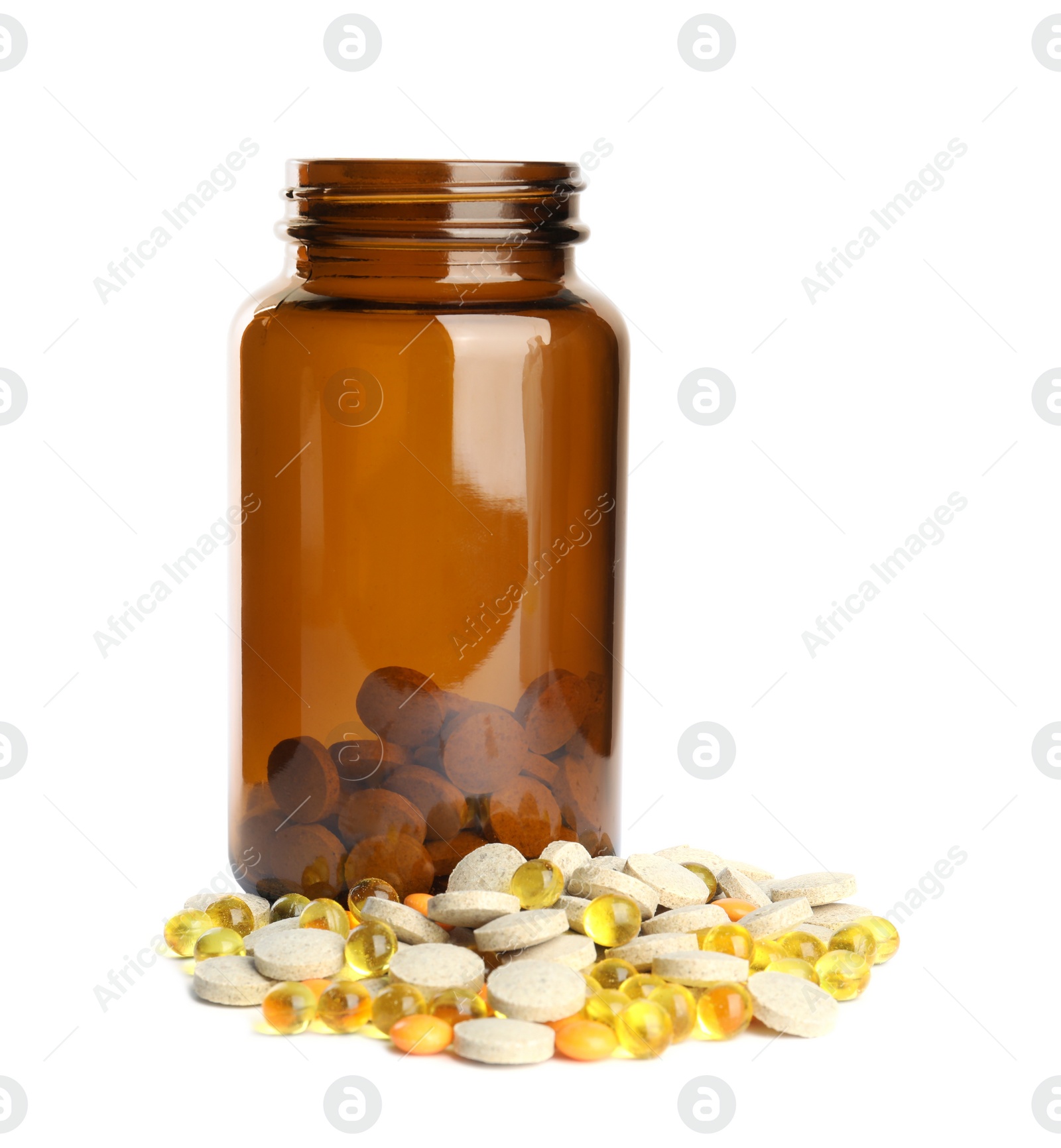 Photo of Bottle with different vitamin pills isolated on white