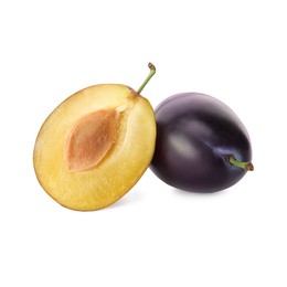 Photo of Whole and cut ripe plums on white background