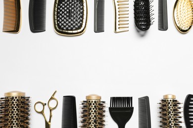 Photo of Hairdressing tools on white background, flat lay. Space for text