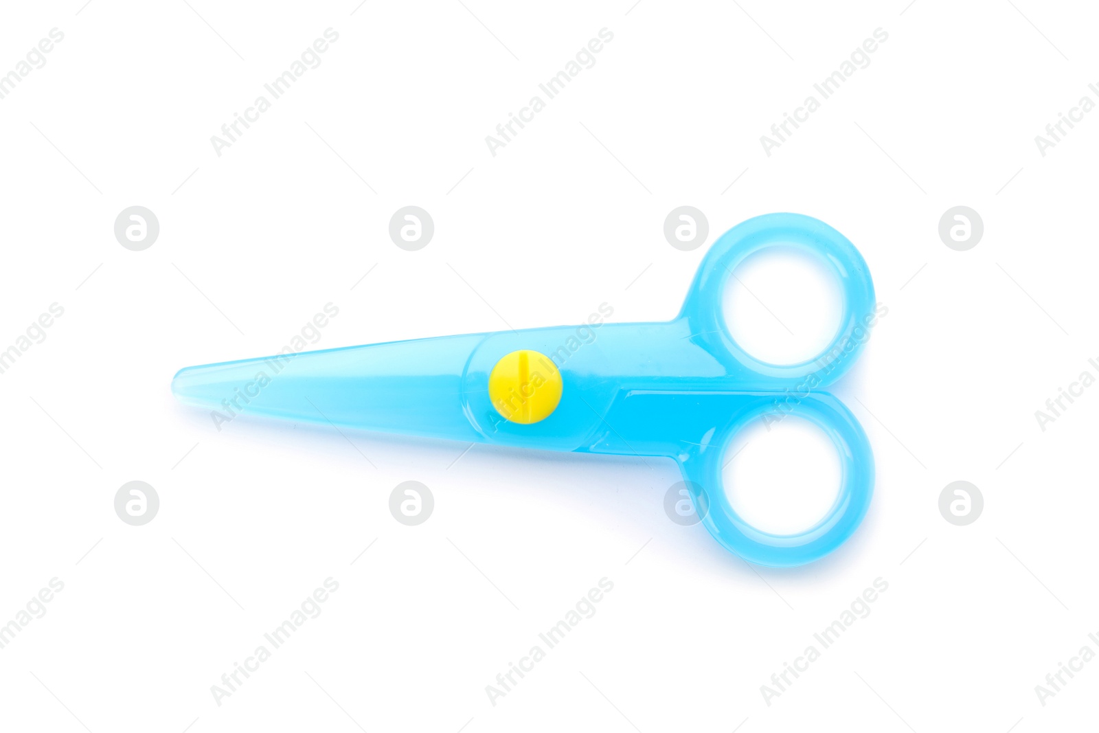 Photo of Blue plastic scissors on white background. Stationery for school