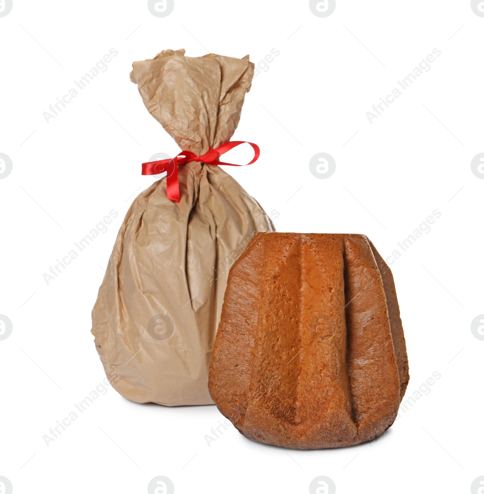 Photo of Delicious Pandoro cakes on white background. Traditional Italian pastry