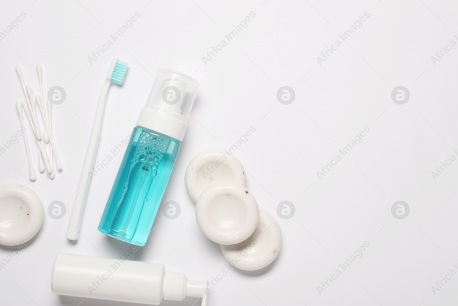 Photo of Bath accessories. Different personal care products on white background, flat lay with space for text