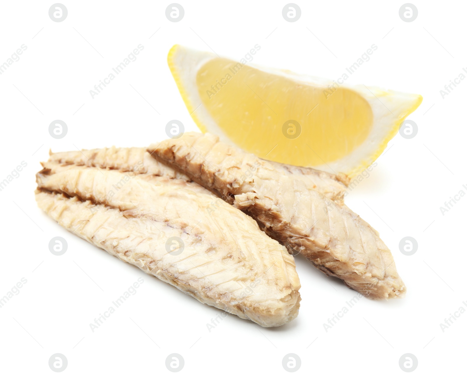 Photo of Canned mackerel fillets with lemon on white background