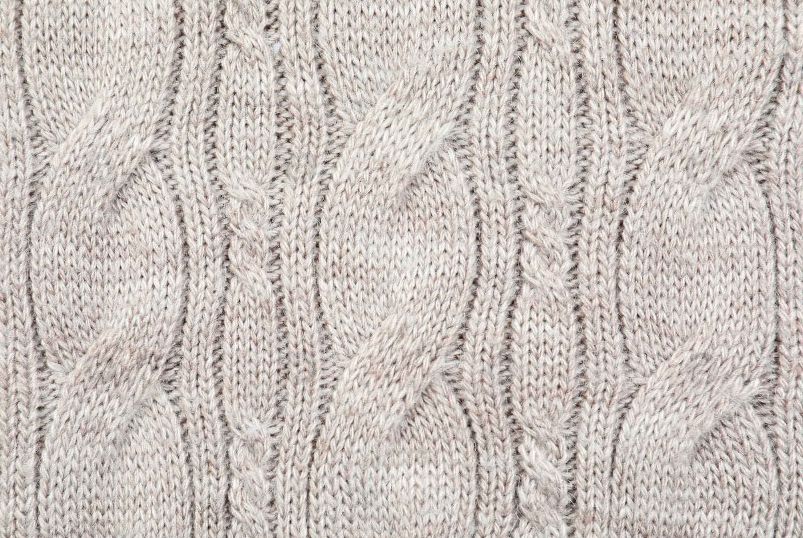 Photo of Texture of cozy warm sweater as background, closeup