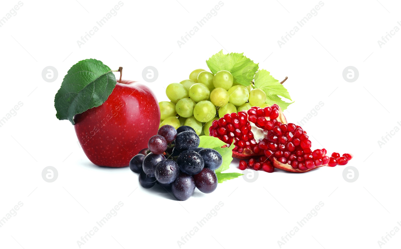Image of Ripe juicy grapes, apple and pomegranate on white background
