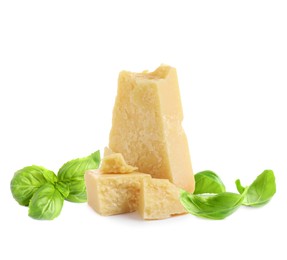 Delicious parmesan cheese and basil on white background