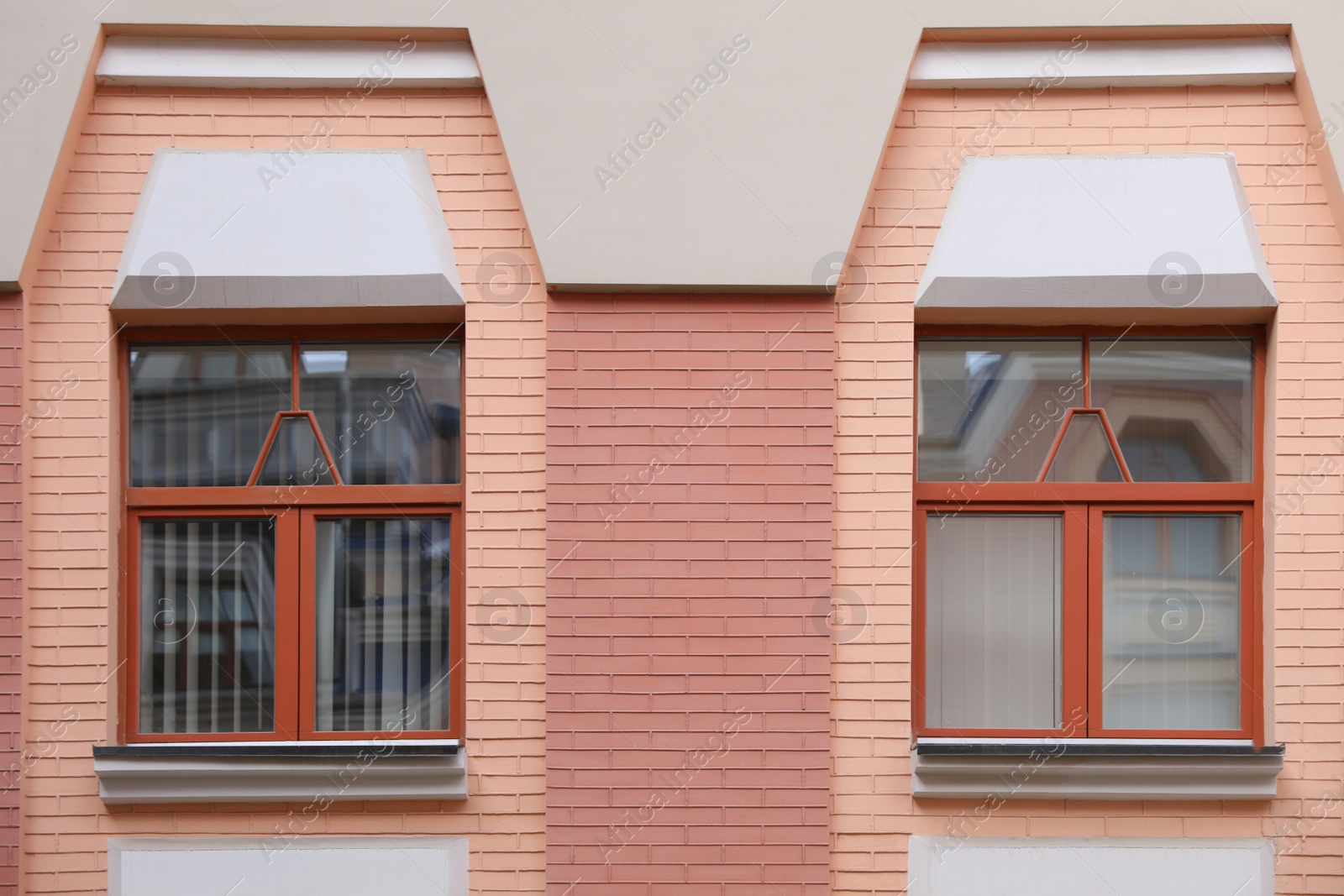 Photo of Wall of vintage building with beautiful windows