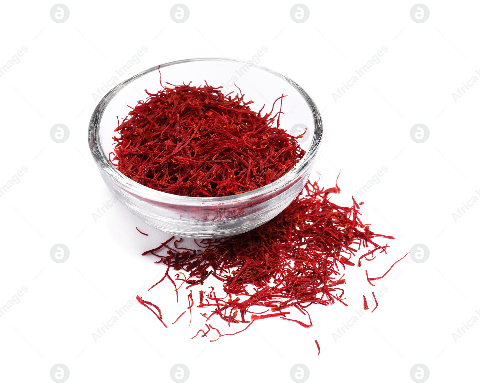 Photo of Aromatic saffron and bowl isolated on white