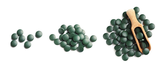 Image of Set of spirulina pills on white background, top view. Banner design