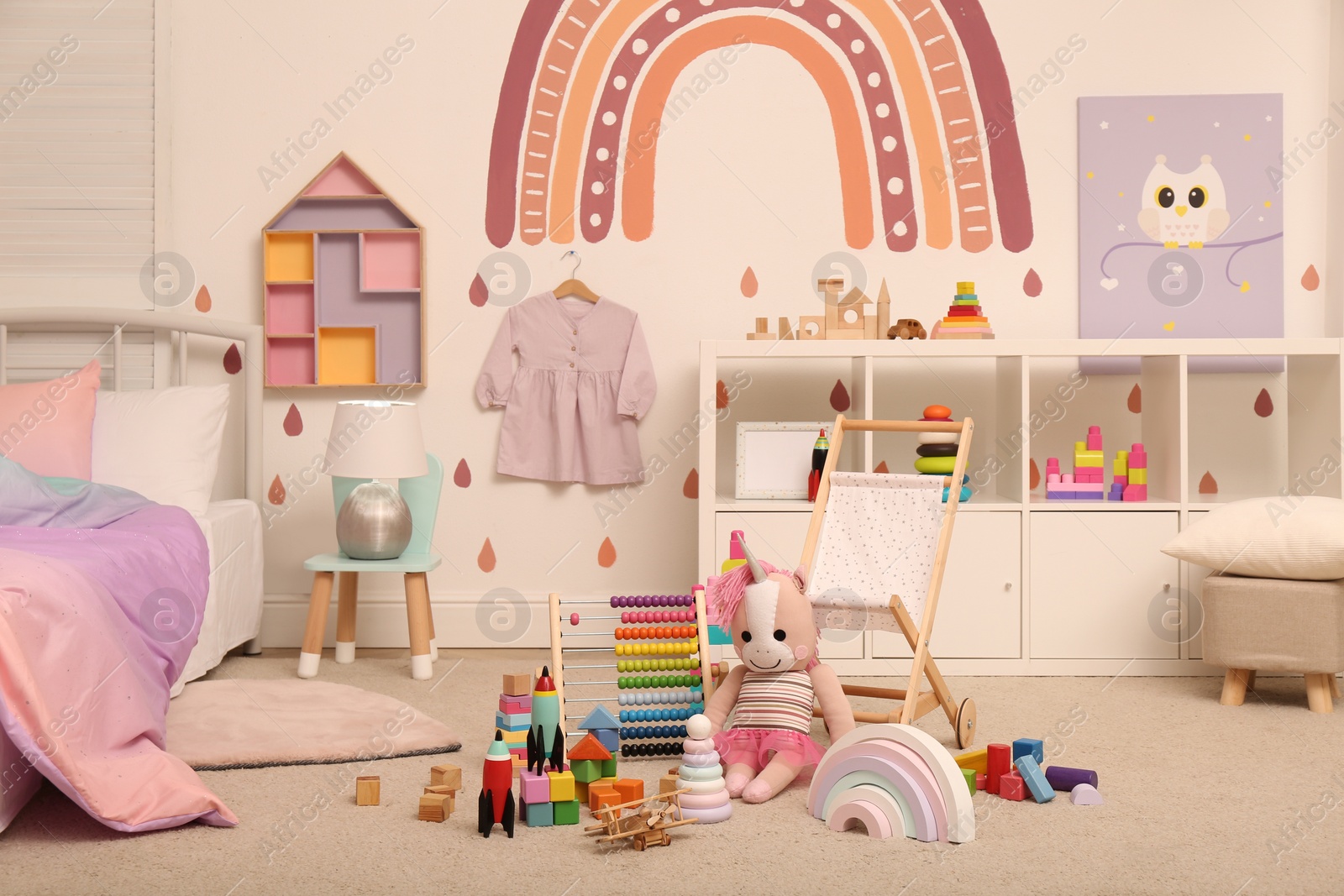 Photo of Many different toys on floor in child's room