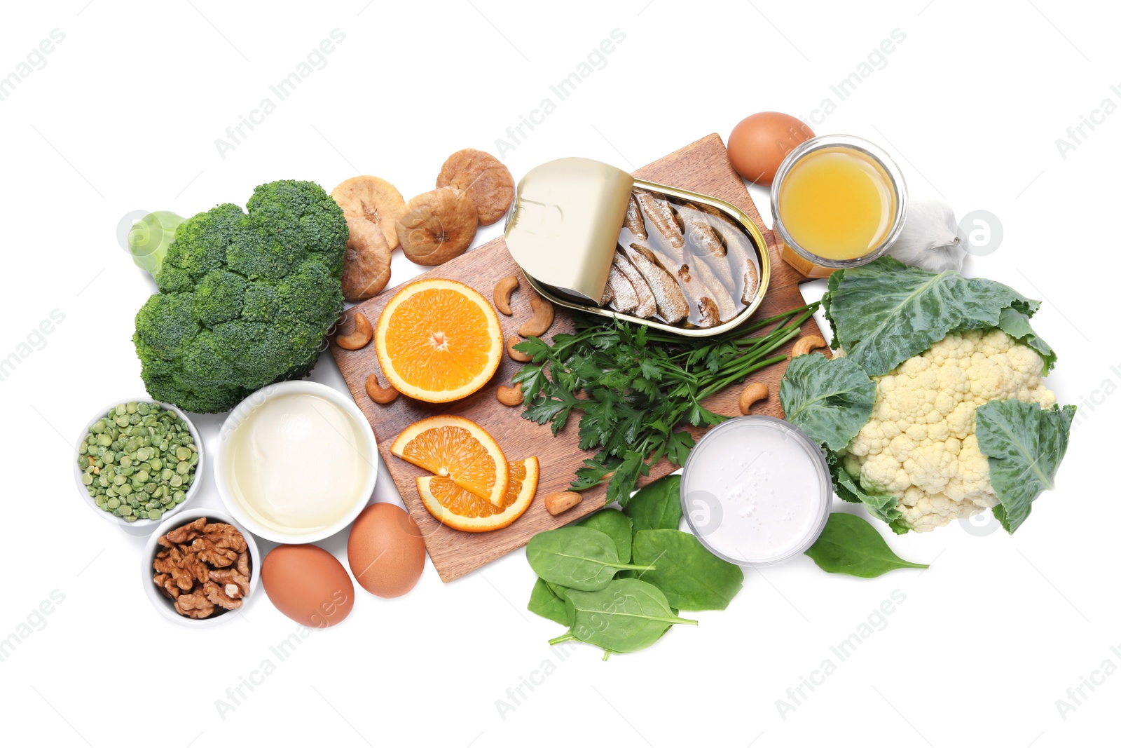 Photo of Set of natural food high in calcium on white background, top view