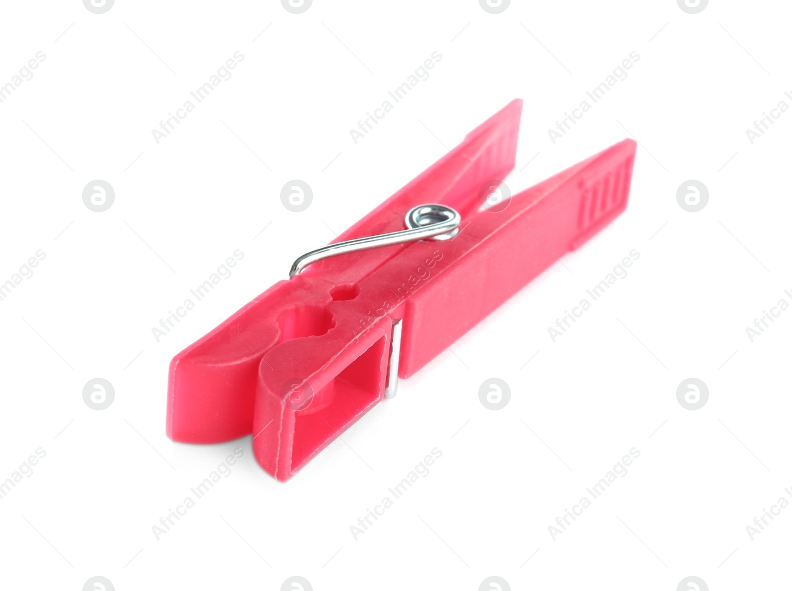 Photo of Bright pink plastic clothespin isolated on white