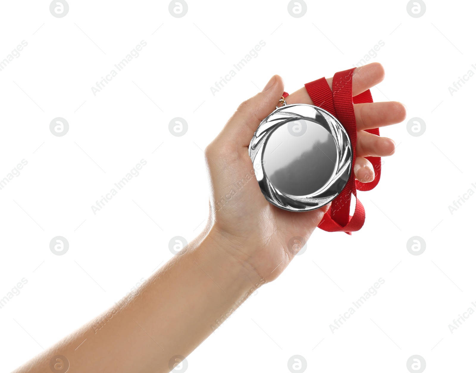 Photo of Woman holding silver medal on white background, closeup. Space for design