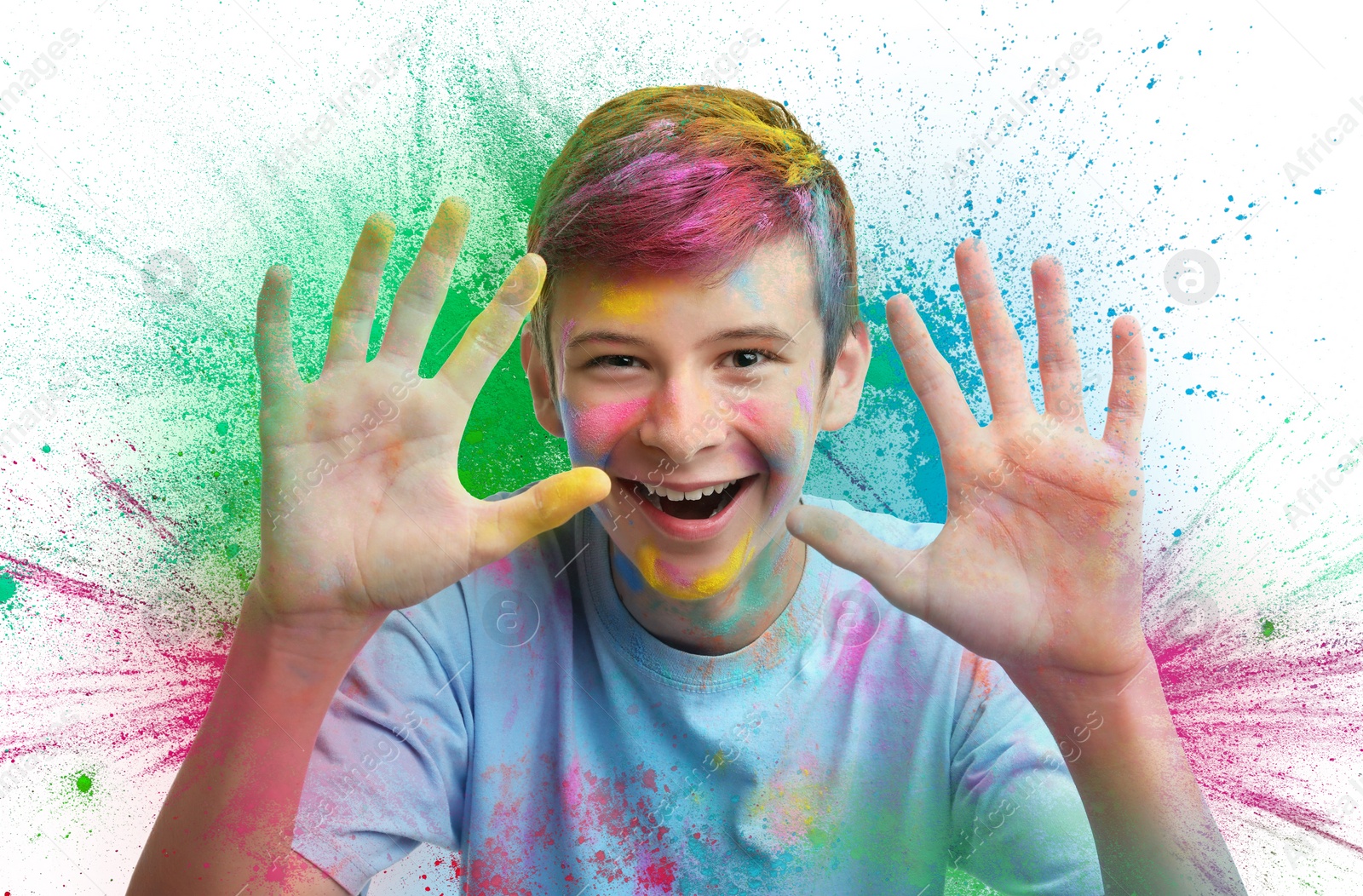 Image of Holi festival celebration. Happy teen boy covered with colorful powder dyes on white background