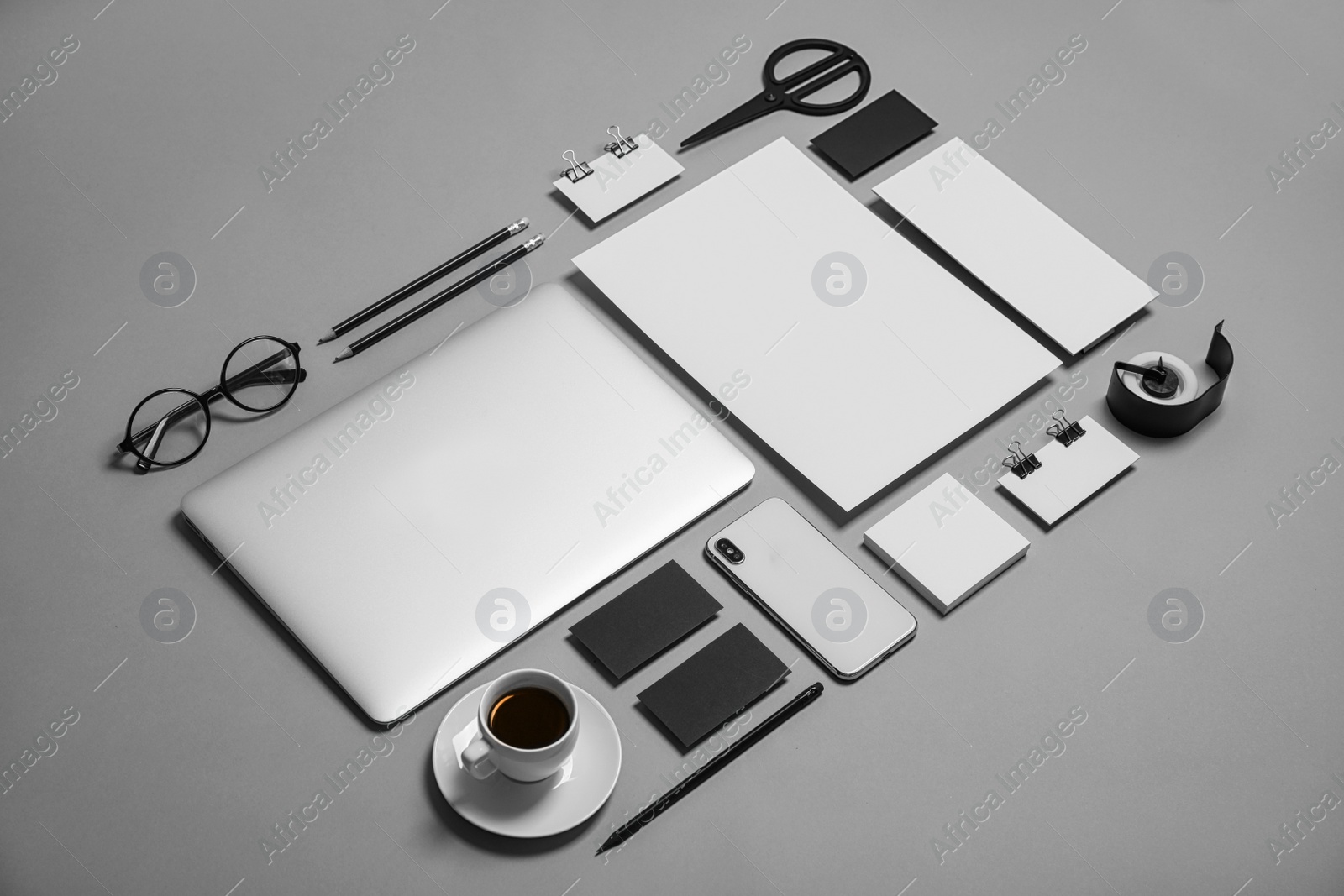 Photo of Composition with stationery on grey background. Mock up for design