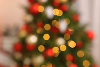 Photo of Blurred view of beautiful Christmas tree, closeup