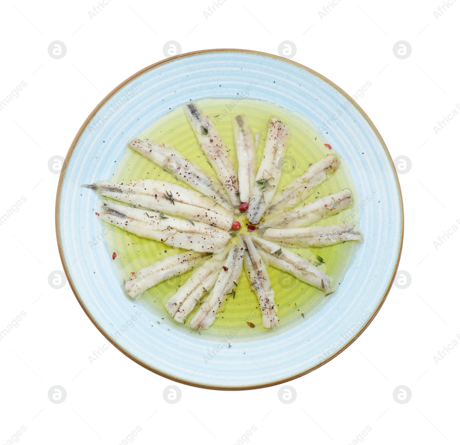 Photo of Tasty pickled anchovies with spices isolated on white, top view